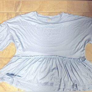 I’m selling this beautiful baby blue shirt. It is a size XL.